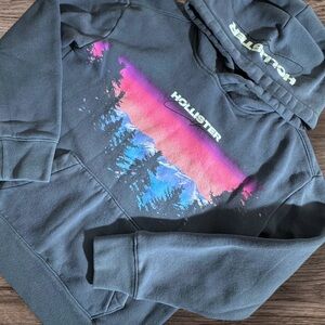 Hollister Y2K Charcoal Blue Hoodie with Vibrant Pink and Blue Mountain Graphic